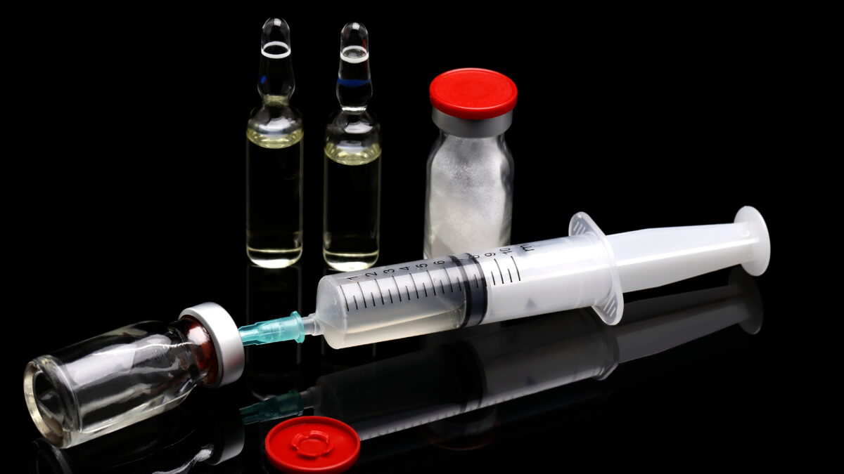 Image showing syringe and cortisone bottles