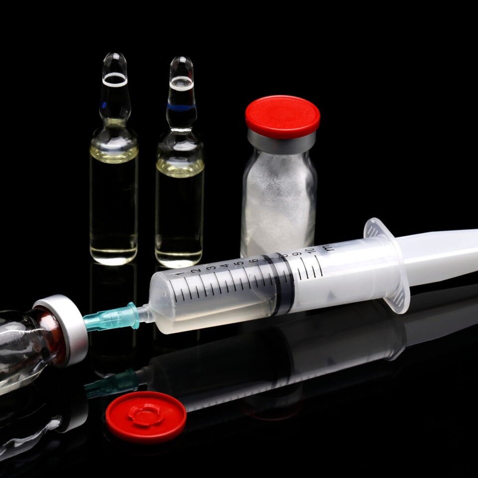 Image showing syringe and cortisone bottles